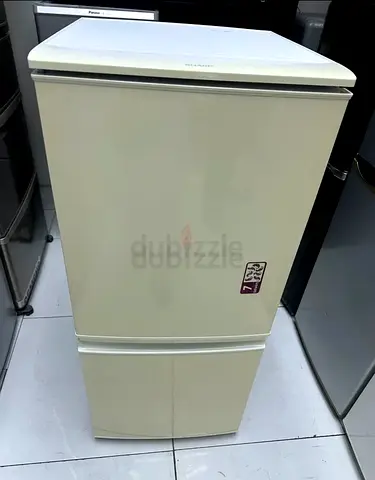 Sharp small refrigerator and bottom freezer neat and clean
