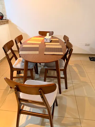 Wooden round dining table with 4 chairs - great condition from Danube. Only 4 months  barely used