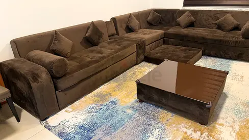 Large L-shaped Brown Velvet Sofa with Matching Ottoman and Coffee Table