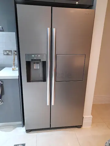 Daewoo latest model side by side refrigerator with water dispenser and ice maker also mini bar 600 l