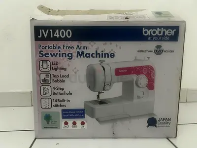 Brother JV1400 Portable Free Arm Sewing Machine - Small Home Model