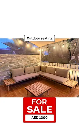 Outdoor corner seating set with cushions and coffee table - AED 1300