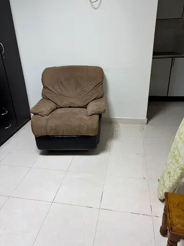 Single brown fabric recliner chair - comfortable armchair