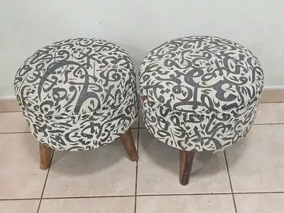 Set of Two Round Ottomans with Calligraphy Design