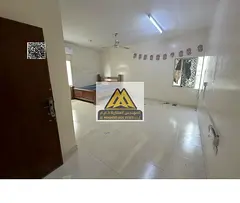 Large studio in Al Nakheel 1, spacious area, separate kitchen, split AC. AED 17K yearly, 4 payments,