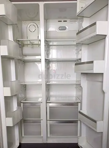 Spacious Double-Door Refrigerator - Clean Interior, Working Condition