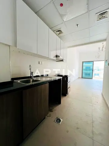 Bright Studio Apartment | One Month Free| Balcony | Prime Warsan 4 Location