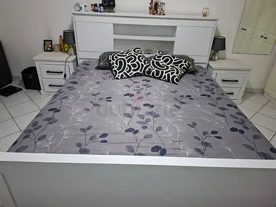 White wooden bed frame with headboard and matching bedside tables - queen with mattress