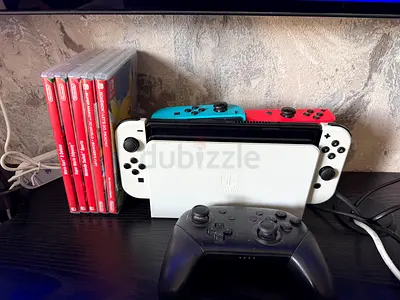 Nintendo switch OLEd with extra controllers and dock