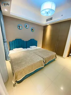 Highend furnished apartment at a very special monthly rent price with free parking kids area gym and