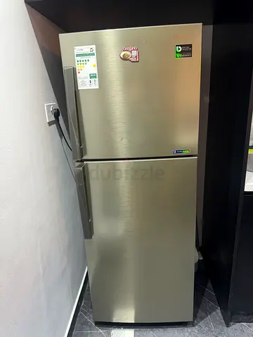 Clean Double-Door Refrigerator with Freezer (Good Working Condition)