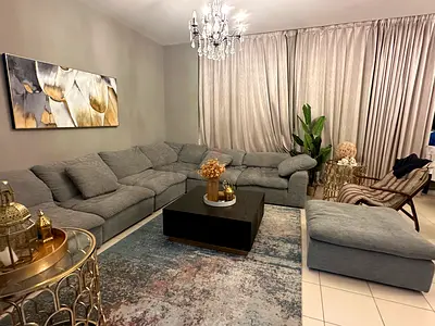 Large L-shaped Grey Fabric Sofa with Ottoman - Very Good Condition
