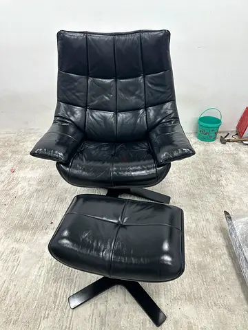 Still brand new Natuzzi arm chair with ottoman stool