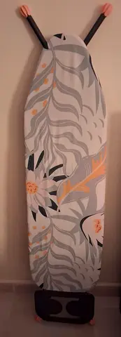 Lightweight ironing board with cover and hanger