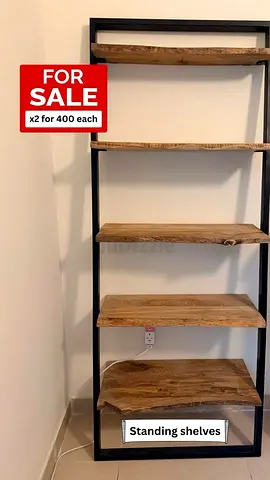 Industrial-style standing wooden shelves with metal frame