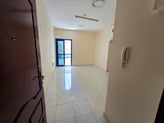 One BR Al Majara balcony spacious free parking central AC gas easy access Dubai Ajman.