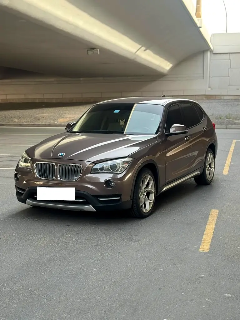 BMW X1 2014 — photo 1 of 14