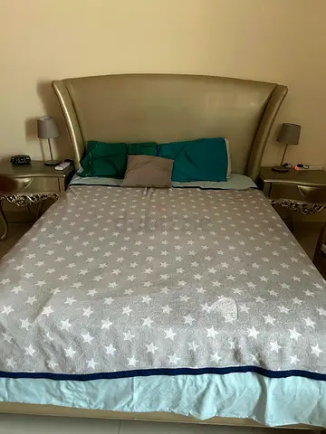 Queen-sized bed frame with matching bedside tables (gold finish)