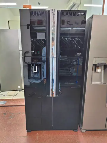 Hitachi latest model 4 door refrigerator with water dispenser black glass version