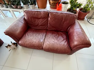 Used Brown Leather 2-Seater Sofa — Comfortable, Well-Worn