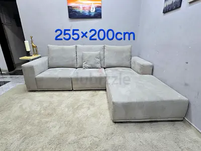 Light grey L-shaped sofa 255×200 cm - good condition