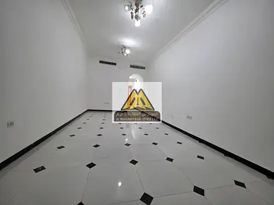 Studio apartment for annual rent | Al Rawda 3 | High-end finishing | Spacious area | On the Dubai and Sharjah exit | In the heart of all services
