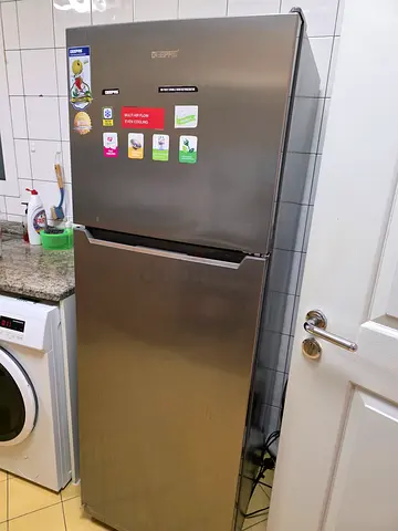 Silver single-door refrigerator in good condition