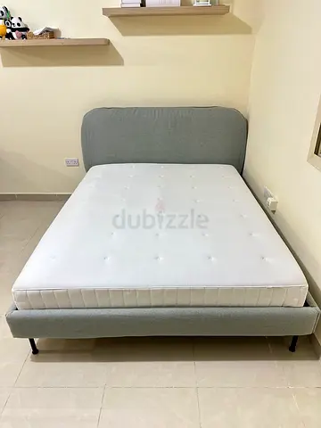 Almost new, Grey upholstered queen bed frame with mattress included. From ikea 160cm x 200cm