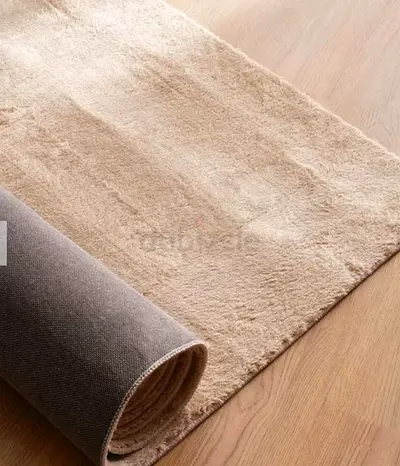 Beige Plush Solid Area Rug - Good Condition