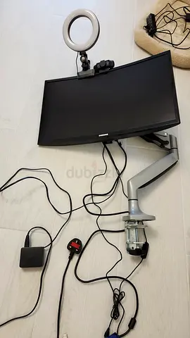 25 inch curved Samsung monitor with arm, camera and light