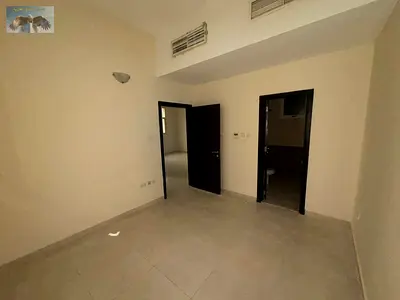 For annual rent a spacious apartment located in Al Jurf, featuring two bedrooms a comfortable living room two bathrooms and central air conditioni