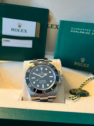 Rolex 114060 40 mm , year 2020 , unpolished , full set. Factory Stickers on the clasp