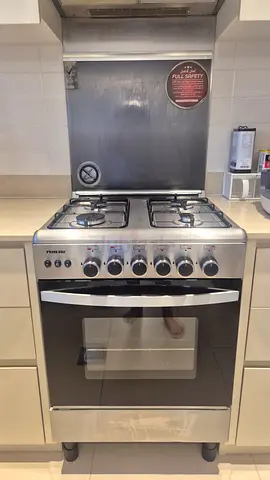Stainless Steel 4-Burner Gas Cooker with Oven - Good Working Condition