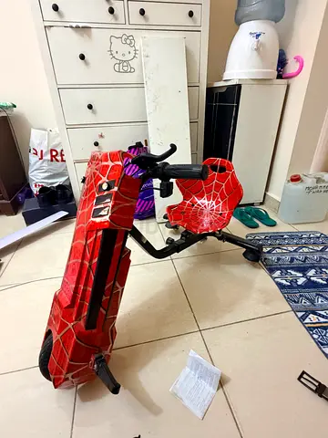 Red Spider-Man Themed Kids Scooter with Seat and Handlebar Basket