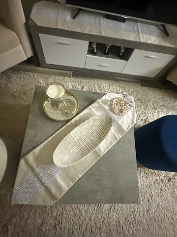 Grey rotative coffee Table.