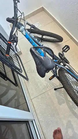 Used mountain bike with rear rack — good working condition