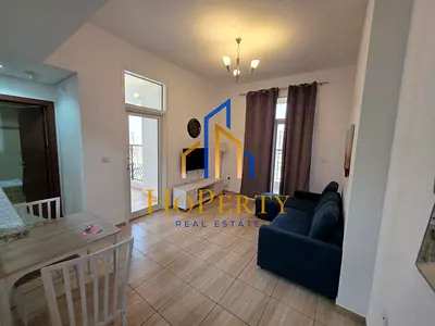 شقة مفروشة بغرفة نوم واحدة | برج صباح JVC | شرفة وإطلالات على المدينة