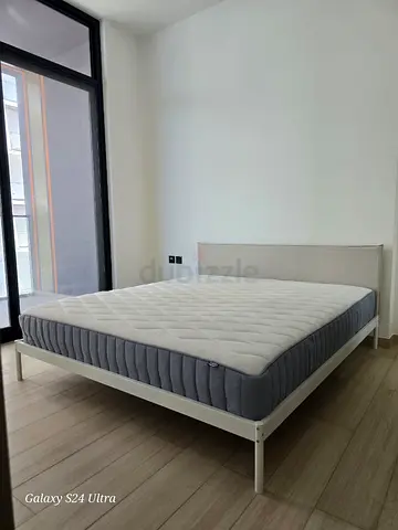 Queen metal bed frame with mattress included - good condition