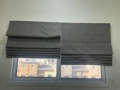 Pair of grey fabric Roman blinds — excellent condition.  110cm wide x 3m length