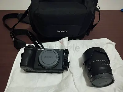 Sony Alpha a6700 mirrorless camera body with 18-135mm lens and bag