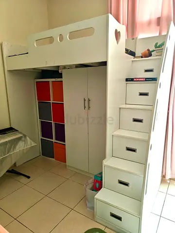 White loft bunk bed with storage stairs and wardrobe