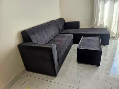 L-shaped Dark Grey Velvet Sofa with Ottoman - Good Condition