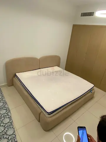 Queen-size upholstered bed frame  new