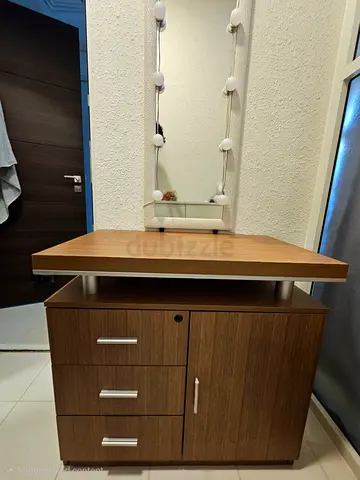 Compact wooden bedside cabinet with drawers and shelf
