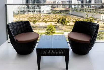 Outdoor rattan balcony set — 2 chairs + coffee table, good condition