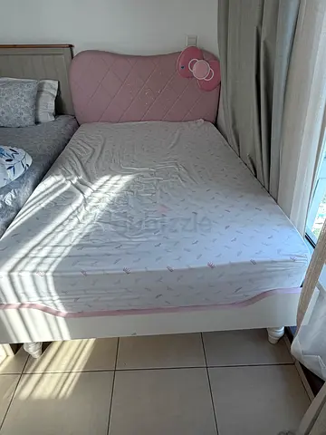 Single / child bed with mattress and padded headboard - good condition 120 X 200