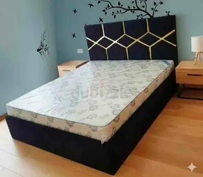 Queen size upholstered bed frame with mattress and headboard