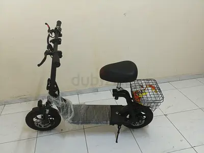 Electric scooter with seat and rear basket — good condition only use 3times like a new
