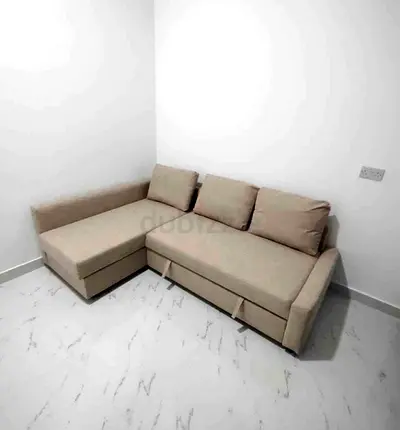 Ikea L Shape Sofa cum bed with big storage in L