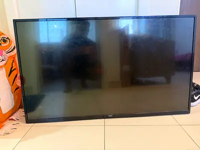 Black Flat Screen TV with Slim Bezel